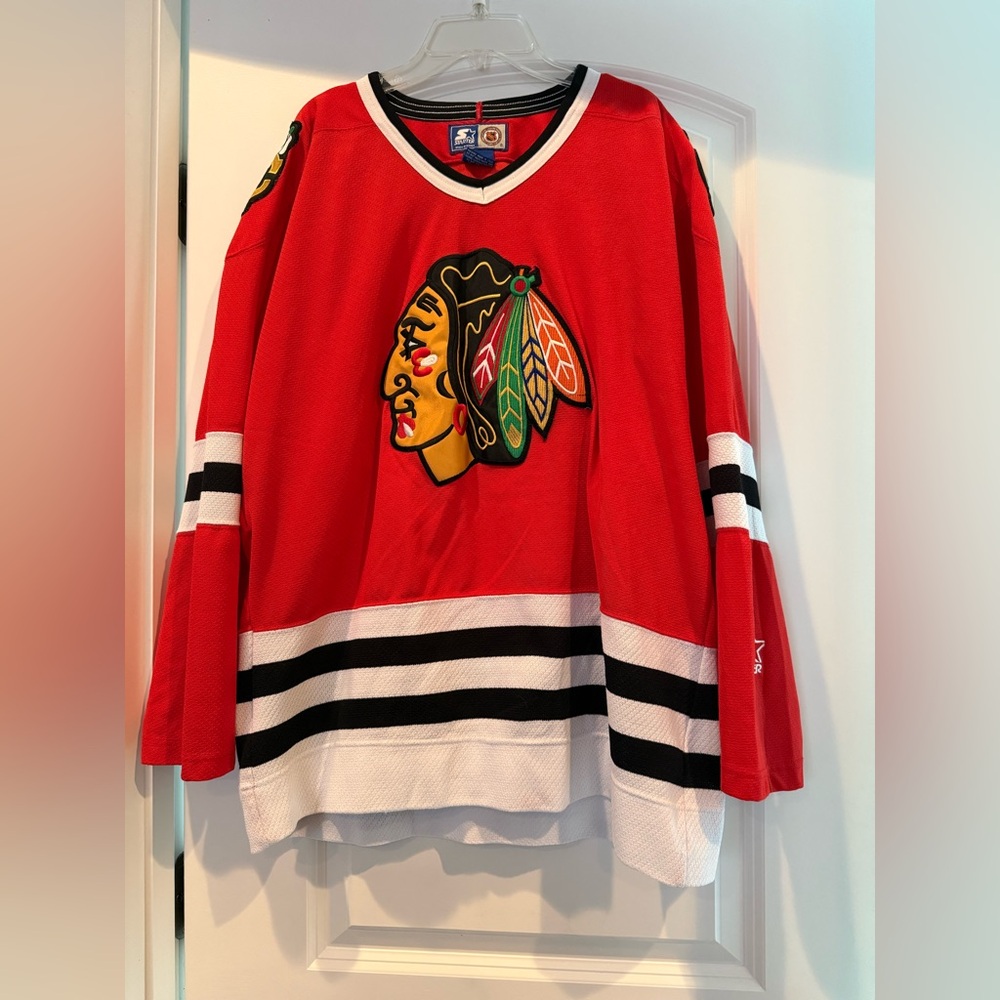 Vintage 90’s STARTER Chicago Blackhawks Jersey.